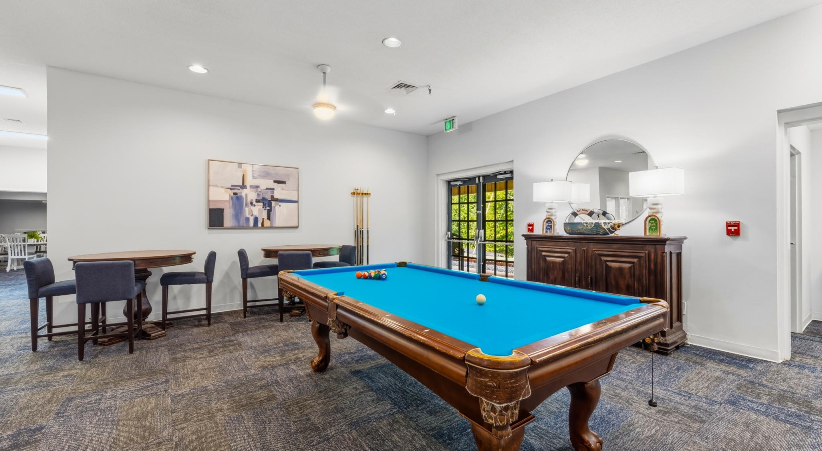 a game room with pool table