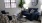 a living room with a chair and a couch